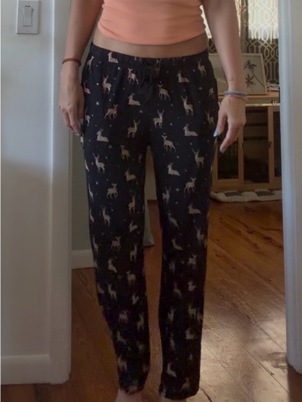Kyte BABY Black Reindeer Pajama Pants. Men’s style but I wore them as a woman.